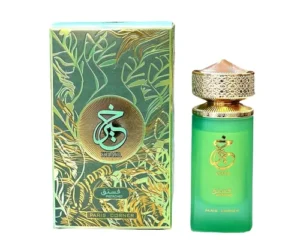 Groene flacon van Paris Corner parfum met gouden details, naast een luxe doos met bladmotief en Arabische kalligrafie.