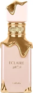 Luxe parfumfles Eclaire van Lattafa in zacht roze met gouden details.