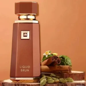 Luxe bruine parfumfles met gouden accenten, omringd door kaneel en kardemom.